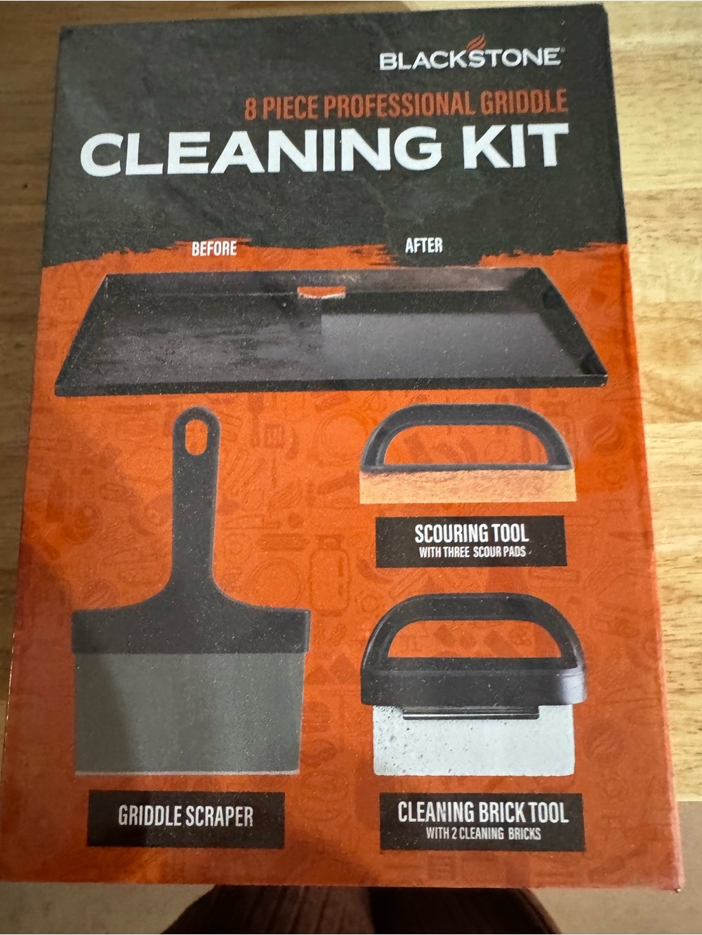 Blackstone Orange and Black 8-Piece Griddle Cleaning Kit Packaging
